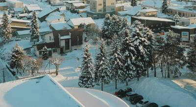 Niseko ski resort powder snow Hokkaido Japan — champagne powder slopes and outdoor onsen