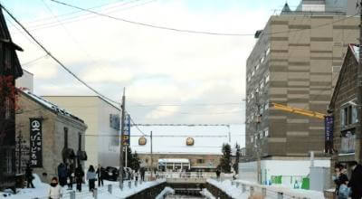 Otaru canal gas lanterns Meiji era warehouses Hokkaido Japan — snow lantern festival winter