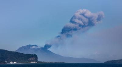 Kagoshima Sakurajima active volcano eruption Japan — ash cloud lava fields Kinko Bay ferry